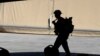 FILE - A U.S. soldier is seen during a handover ceremony of Taji military base from U.S.-led coalition troops to Iraqi security forces, in the base north of Baghdad, Iraq, Aug. 23, 2020. 