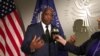 Dr. Morrissanda Kouyaté au micro de Nathalie Barge lors du Sommet sur les MGF à Washington