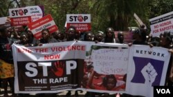 FILE - Protesters march in Blantyre, Malawi, Nov. 16, 2020, against increased cases of sexual abuse against women and girls. A group of women's lawyers is now accused of double-dipping while representing women in a rape case. (Lameck Masina/VOA)