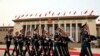 FILE - Members of the Chinese military march as President Donald Trump and Chinese President Xi Jinping participate in a welcome ceremony at the Great Hall of the People, Nov. 9, 2017, in Beijing, China.