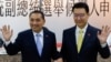 FILE - Hou Yu-ih, candidate for Taiwan's presidency from the main opposition party KMT, and Jaw Shaw-Kong, vice presidential candidate, make a campaign appearance in Taipei on Nov. 24, 2023. Analysts say China's goal is to help KMT win the Jan. 13 elections.