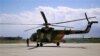FILE - This May 13, 2013 file photo shows a Mi-17 helicopter, used by the Afghan Air Force sitting on Bagram Air Field in Afghanistan. 