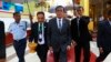 Thailand's Prime Minister Prayuth Chan-ocha, center, tours Shwedagon Pagoda on first official visit to Myanmar, also known as Burma, Oct. 10, 2014.