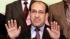 FILE - Iraqi Prime Minister Nouri al- Maliki speaks to the press in Baghdad, Iraq.