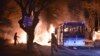 Firefighters work at a scene of fire from an explosion in Ankara that killed 28 people, Feb. 17, 2016. 