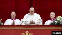 Pope Francis delivers his traditional Christmas Day Urbi et Orbi message at the Vatican
