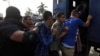 Police detain students in al-Azhar university after a student protest in Cairo, Oct. 30, 2013.