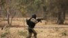 A soldier from Burkina Faso participates in a simulated raid during the U.S. sponsored Flintlock exercises in Ouagadougou, Burkina Faso February 24, 2019.